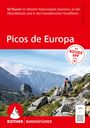 Text: "52 Touren im ältesten Nationalpark Spaniens", "Picos de Europa", "Mit ROTHER APP". Zwei Wanderer in bergiger Landschaft.