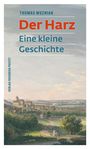 "THOMAS WOZNIAK Der Harz Eine kleine Geschichte" zeigt eine Landschaft mit einer Stadt im Hintergrund und Menschen im Vordergrund.