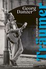 Aufschrift "Georg Danzer", "Träumer", "Texte und Lieder". Ein Mann lehnt mit Gitarre an einem Laternenpfahl.