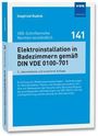 "Elektroinstallation in Badezimmern gemäß DIN VDE 0100-701" ist auf dem Buchcover zu sehen. Es ist blau mit weißem Text.