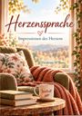 "Herzenssprache: Impressionen des Herzens" von Heidrun M'Butu. Gemütlicher Sessel mit Kissen, Tasse "Wertvoll".