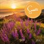 "Sunsets" Hochwertiger Fotokalender. Lila Blumen im Vordergrund, Sonnenuntergang über Hügeln in der Ferne. Jahr 2027.