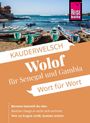 KAUDERWELSCH Wolof für Senegal und Gambia Wort für Wort. Boorom lammñ du réer. Wer zu fragen weiß, kommt weiter. Rows bunte Boote am Strand vor blauem Meer.