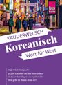 KAUDERWELSCH Koreanisch Wort für Wort. Wie geht es Ihnen denn so? Stadtansicht mit hellen Leuchtreklamen.