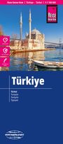 "Türkiye. Türkiye, Türkei, Turquie, Turquía, Турция." Eine Moschee am Wasser mit einer Brücke im Hintergrund.