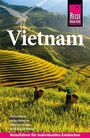 "Vietnam", "Reiseführer für individuelles Entdecken". Zwei Personen mit Körben in Reisfeldern.