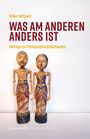 "Was am anderen anders ist: Beiträge zur Ethnographie Südostasiens." Zwei bunte Holzfiguren, ein Mann und eine Frau.
