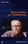 "Heinz Kohut zur Einführung" steht in orange auf dunkelblauem Hintergrund. Foto eines Mannes mit Brille unten abgebildet.