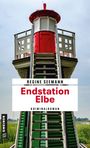 "Endstation Elbe" von Regine Seemann, Kriminalroman. Oben ein roter und weißer Leuchtturm mit grünen Stufen.