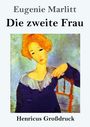 Titel: "Die zweite Frau" von Eugenie Marlitt. Darunter Illustration einer Frau mit rotem Haar auf einem Stuhl.