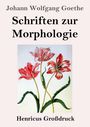 „Schriften zur Morphologie“ von Johann Wolfgang Goethe. Darunter Illustration von drei roten Blumen mit grünen Blättern.