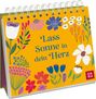 "Lass Sonne in dein Herz" umgeben von bunten Blumen und einem kleinen roten Quadrat mit "GROH".