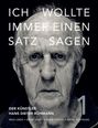 Großer Text: "ICH WOLLTE IMMER EINEN SATZ SAGEN". Darunter: "DER KÜNSTLER HANS DIETER RÜHMANN". Nahaufnahme eines älteren Mannes.