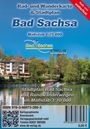 **Rad- und Wanderkarte & Stadtplan Bad Sachsa**  
Älteres Gebäude an einem See unter klarem, blauem Himmel.