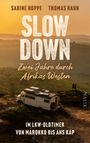 "SABINE HOPPE, THOMAS RAHN, SLOW DOWN Zwei Jahre durch Afrikas Westen, IM LKW-OLDTIMER VON MAROKKO BIS ANS KAP." Sonnenuntergang, Landschaft.