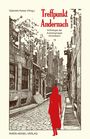 "Treffpunkt Andernach" in roter Schrift, eine Frau in Rot geht durch eine gepflasterte, historische Gasse.