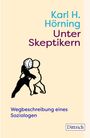 "Unter Skeptikern" von Karl H. Hörning. Illustration: Zwei Figuren umarmen sich, eine hat ein Zifferblatt als Kopf.