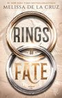 "Rings of Fate" in großen Buchstaben, Autorin Melissa de la Cruz. Zwei verschlungene, dekorative Ringe im Hintergrund.