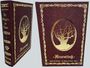 Titel: "Im Schatten der Hexen" und "Hexenring". Goldene Ranken verzieren ein braunes Buch mit einem Baum im Oval.