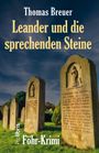Ein Roman von Thomas Breuer mit dem Titel "Leander und die sprechenden Steine". Grabsteine auf einer grünen Wiese.