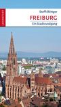 Steffi Böttger, FREIBURG, Ein Stadtrundgang. Lehmstedt Verlag. Ansicht des Freiburger Münsters vor städtischer Kulisse.