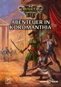 "ABENTEUER IN KOROMANTHIA" steht in großen Buchstaben. Drei Abenteurer mit Waffen stehen in einer antiken Stadtumgebung.
