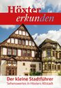 "Höxter erkunden. Der kleine Stadtführer. Sehenswertes in Höxters Altstadt." Fachwerkhäuser mit verzierten Fassaden.