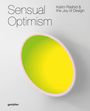 „Sensual Optimism: Karim Rashid & the Joy of Design“. Ein gelb-rosa gewölbtes Objekt auf grauem Hintergrund.