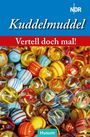 „Kuddelmuddel“, „Vertell doch mal!“, „Husum“. Bunte Glasmurmeln in verschiedenen Farben und Mustern.
