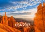 „USA 2027 Limited Edition“ vor malerischer Landschaft mit roten Felsformationen und strahlender Abendsonne.