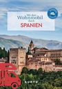 „Mit dem Wohnmobil durch SPANIEN.“ Oberes Bild: Rundlogo „Unterwegs Zuhause“. Berglandschaft mit historischem Gebäude.
