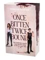 Buchcover mit Titel "Once Bitten Twice Bound" von Rebecca Seidler. Zu sehen sind eine Frau und ein Mann in lässiger Kleidung.