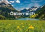"Österreich 2021" vor Alpenkulisse mit blühender Wiese und blauem Himmel im Hintergrund.