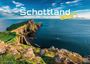 „Schottland 2027, Mystik der Highlands“. Klippen und Leuchtturm an der Küste unter einem blauen Himmel.
