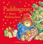 „Paddington feiert Weihnachten“ von Michael Bond. Illustration: Bär mit rotem Hut, Geschenke, Weihnachtsbaum.