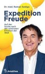 Dr. med. Roman Szeliga, Expedition Freude: Auf der Suche nach der schönsten Emotion der Welt. Gelbe Ballons, lächelnder Mann.