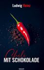 "Ludwig Heinz", "Chili MIT SCHOKOLADE". Eine rote Chili auf dunklem Hintergrund mit Schokoladenstückchen.
