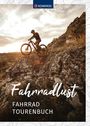 Oben „KOMPASS“, unten „Fahrradlust Fahrradtourenbuch“. Ein Radfahrer fährt auf einem steinigen Weg bei Sonnenuntergang.