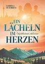 "Ein Lächeln im Herzen. Gefühlschaos inklusive." Illustration: Berge, Paar mit Herz im Sonnenuntergang, Fernsehturm.