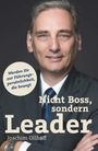 „Werden Sie zur Führungspersönlichkeit, die bewegt. Nicht Boss, sondern Leader.“ Ein Mann im Anzug mit freundlichem Ausdruck.