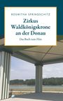 Text: "Roswitha Springschitz, Zirkus Waldkönigskrone an der Donau, Das Buch zum Film." Im Hintergrund ein Flussufer.