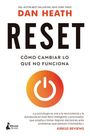Text: DEL AUTOR BEST SELLER DEL NEW YORK TIMES; DAN HEATH; RESET; CÓMO CAMBIAR LO QUE NO FUNCIONA.

Beschreibung: Ein Buchcover mit einem orangefarbenen Power-Symbol.