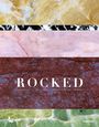 "ROCKED: ARCHITECTS, DESIGNERS & ARTISTS ON STONES." Marmorähnliche horizontale Streifen in verschiedenen Farben.