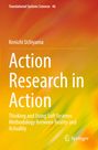 "Action Research in Action" von Kenichi Uchiyama. Gelb-orange Hintergrund mit dynamischen Farbübergängen. Springer-Logo unten.