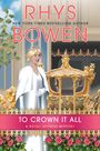„RHYS BOWEN, TO CROWN IT ALL, A ROYAL SPYNESS MYSTERY.“ Frau mit Krone, weißem Umhang neben goldener Kutsche, blauer Himmel.