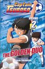 „Captain Tsubasa Volume 2: The Golden Duo“. Zwei Jungen beim Fußballspielen, dynamische Posen, lebendige Farben.