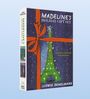 „Madeline's Holiday Gift Set“ und „Two classic board books in one festive box!“ auf einer Geschenkbox mit Turm-Illustration.