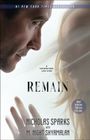 Der Text enthält: "#1 New York Times Bestseller", "A Supernatural Love Story", "Remain", "Nicholas Sparks with M. Night Shyamalan". Zwei Gesichter berühren fast einander, eine Hand im Vordergrund.