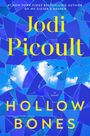 Text: "Jodi Picoult - HOLLOW BONES - a novel." Hintergrund: Blaue, mosaikartige Formen mit Wolken und Vögeln.