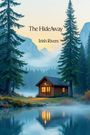 "The HideAway, Irish Rivers." Eine Hütte steht am See, umgeben von hohen Bäumen und Nebel mit Bergen im Hintergrund.